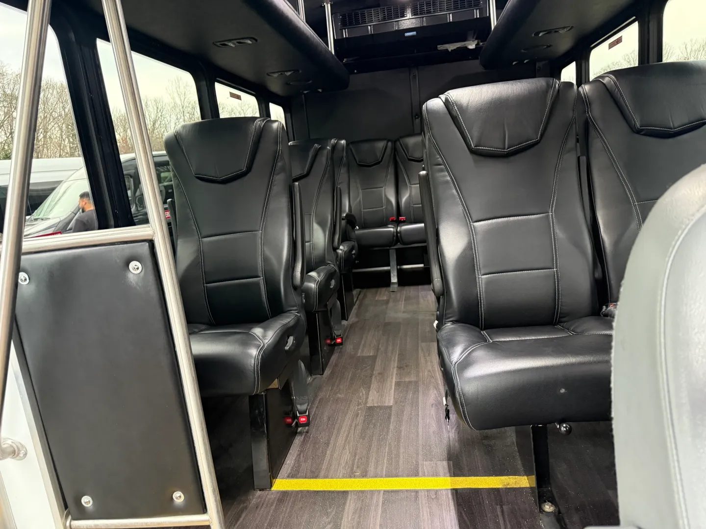 Minibus interior with black leather seats